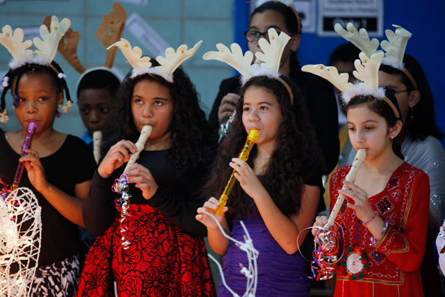 Quitman students perform at a winter concert. Music classes at the school this year are incorporating reading and math instruction. (Amanda Brown / NJ Spotlight)