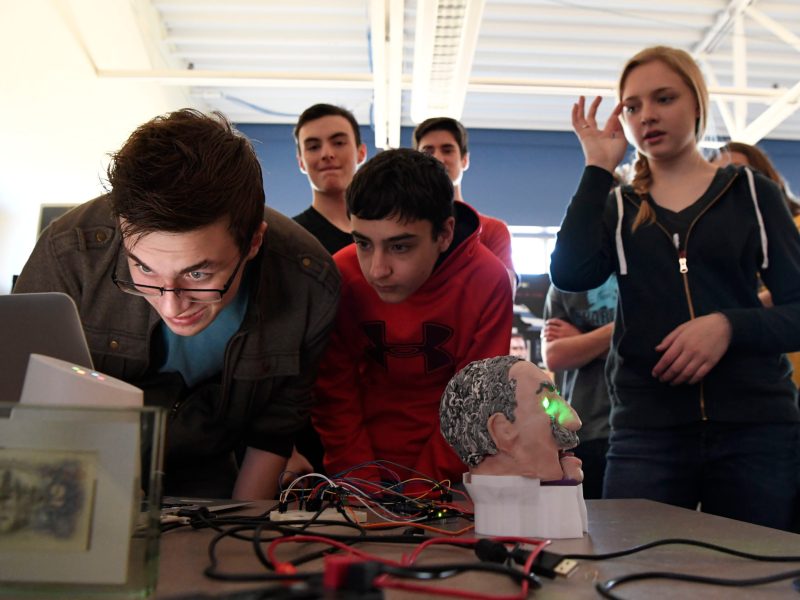 Students at STEM School Academy in Douglas County start the computer program to run their historical figure head with artificial intelligence.