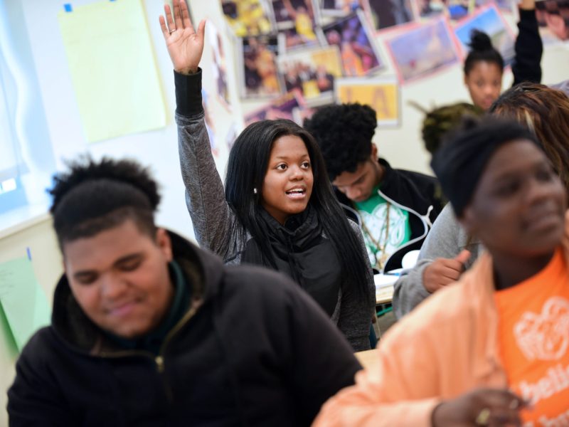 Domonique Crosby raises her hand in calculus class at George Washington Carver High School.