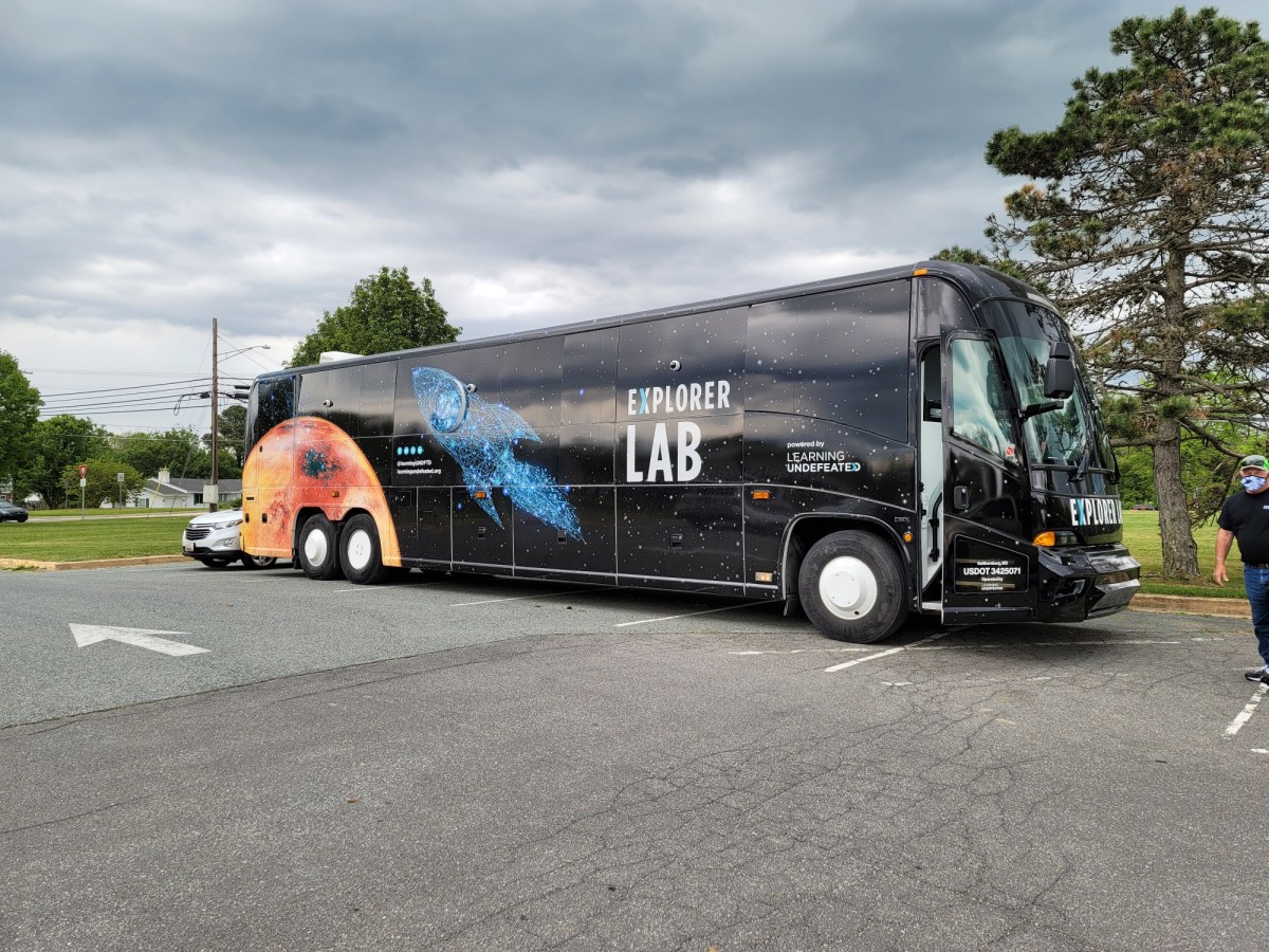 Learning Undefeated's mobile hands-on learning lab sits in a school parking lot.