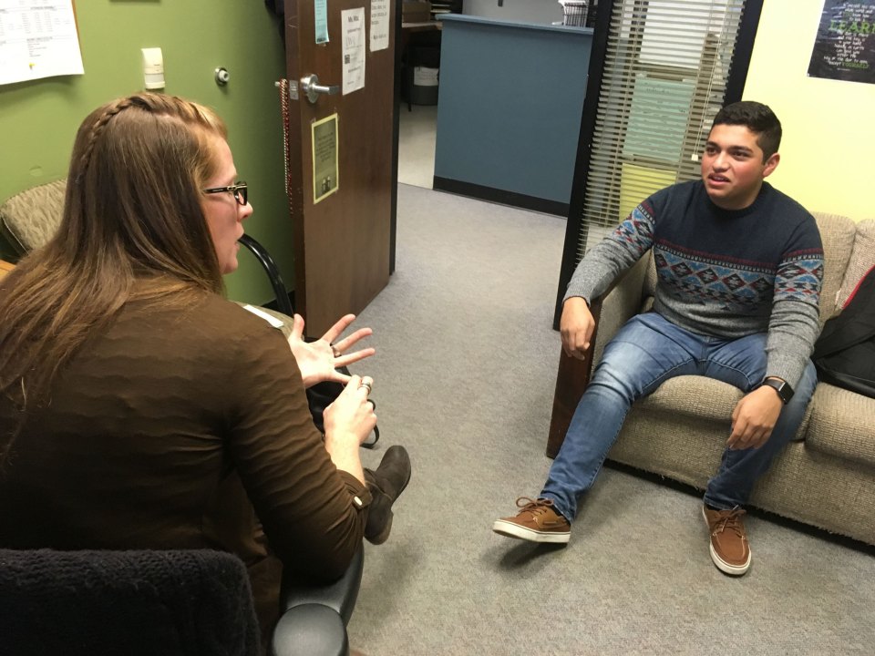 “Since my parents didn’t get much education, it’s hard to talk to them about my schoolwork and applying to college, or how to plan my time and get everything done,” says Mariano Almanza, 18, pictured speaking with his Coronado High School guidance counselor, Colleen McElvogue.