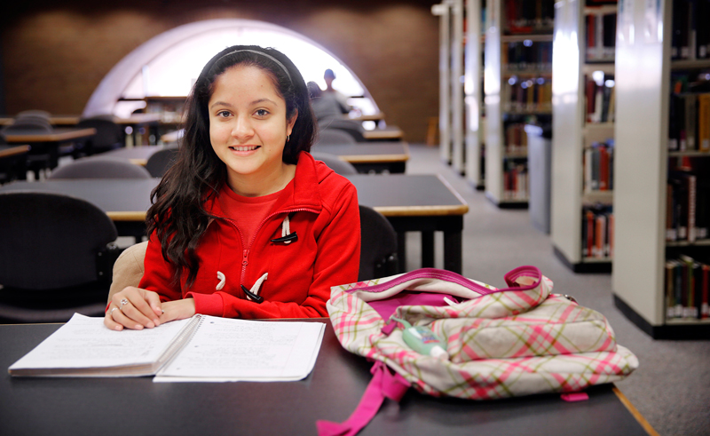 Freshman Esmeralda Rosas of Dallas is going to the University of North Texas because of the Emerald Eagle Scholar program, an affordable education plan for lower-income families. Here she is photographed in the campus library where she comes to study, Monday, January 27, 2014. (Tom Fox/The Dallas Morning News)